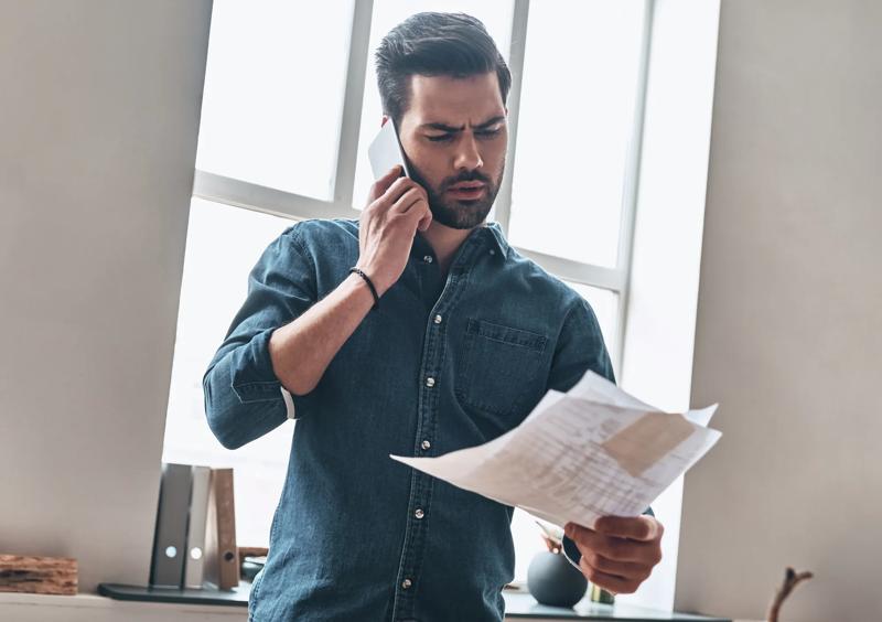 contractor_frustrated_paper_contract